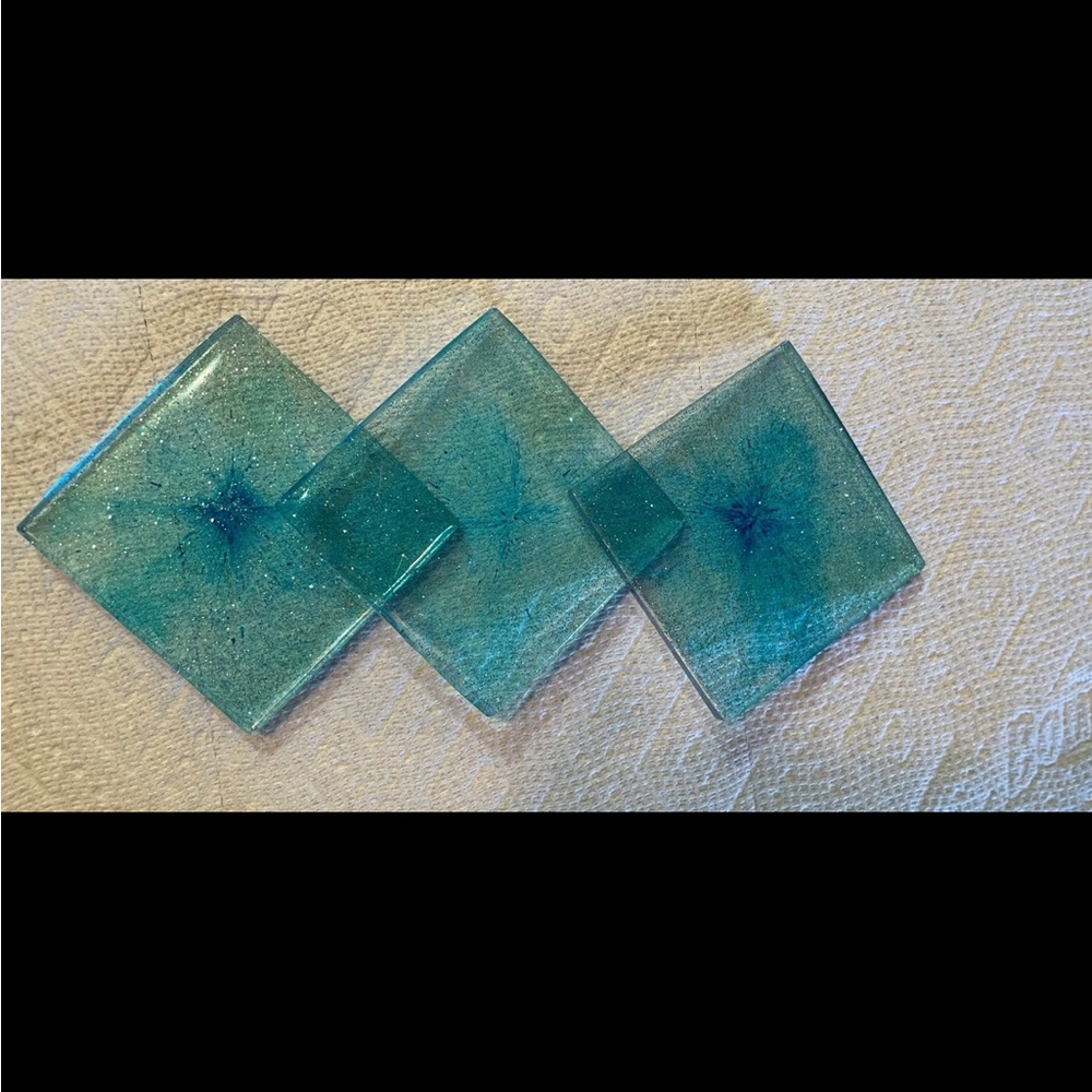 3 square blue epoxy coasters homemade with glitter